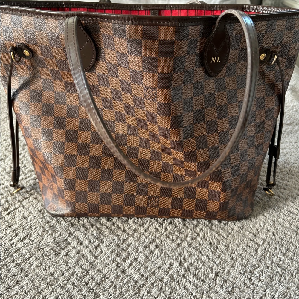 Damier Ebene never full MM , excellent condition.